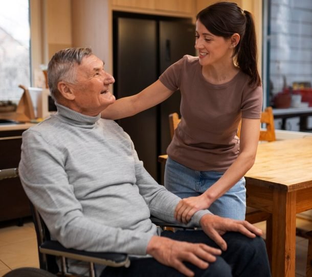 elderly-person-being-taken-care-by-female-caretaker_23-2150216383