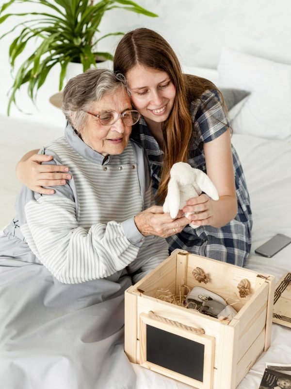 grandmother-checking-old-toys-with-granddaughter_23-2148597133