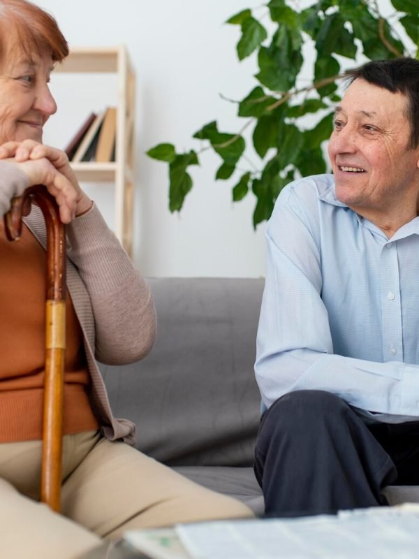 medium-shot-man-woman-with-walking-sticks_23-2148900606