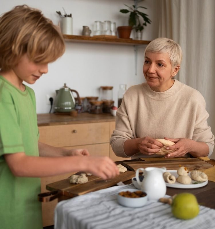 medium-shot-woman-kid-preparing-food_23-2150279884